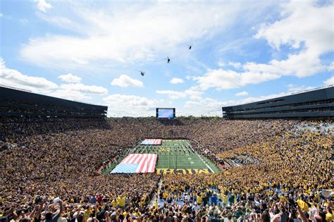 Michigan Flag Tradition At University Of Michigan Stadium